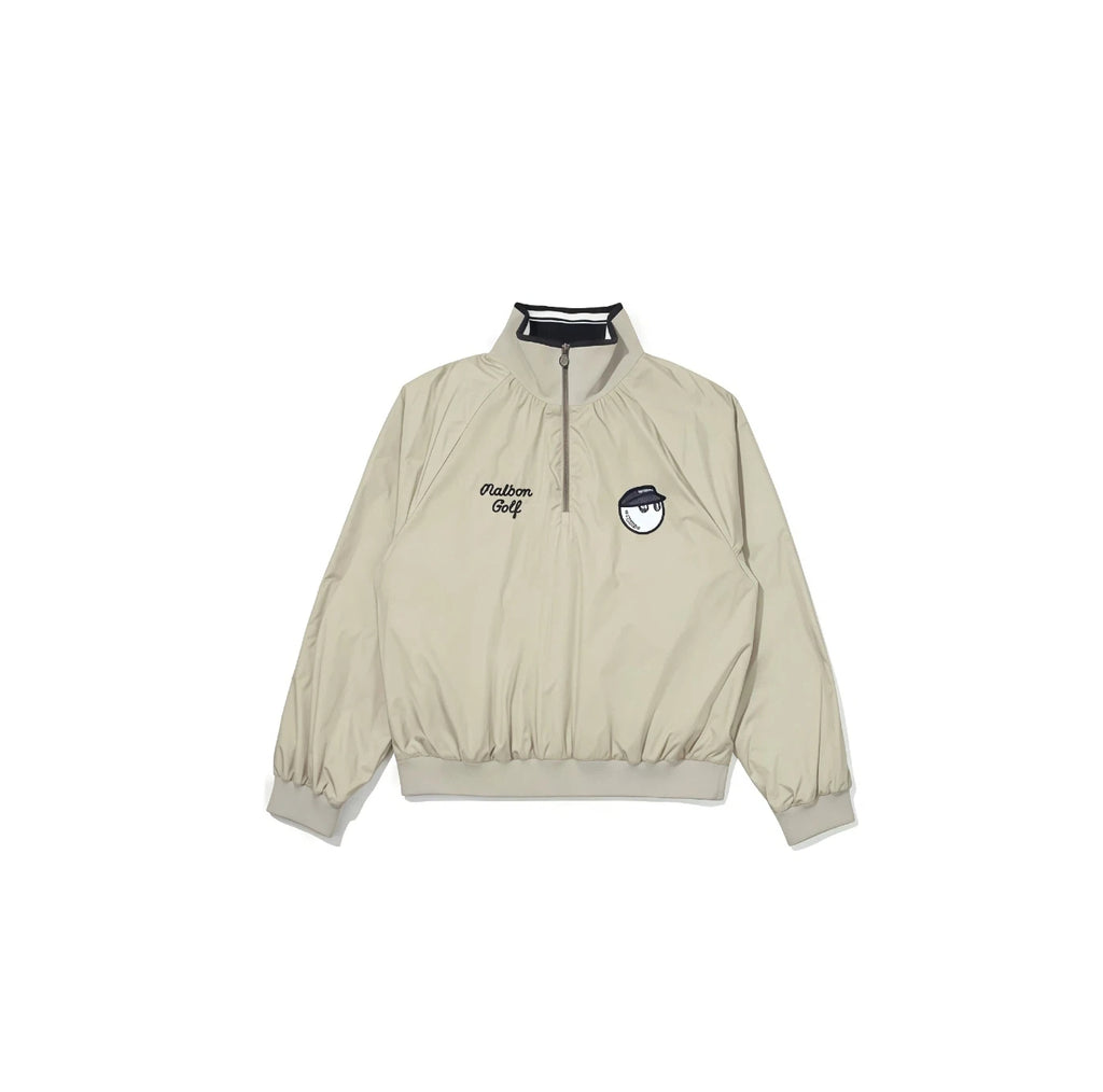 Malbon golf half-zip windbreaker pullover in khaki with stand collar, cursive Malbon Golf script and embroidered chest patches