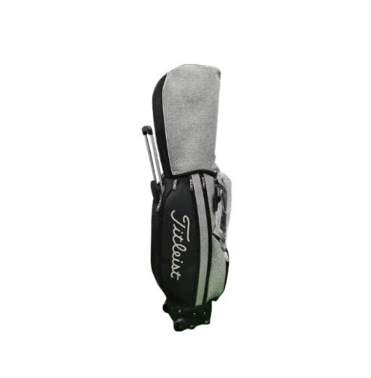 Heather grey and black Titleist waterproof cart golf bag, side view with raised rain hood and white Titleist script