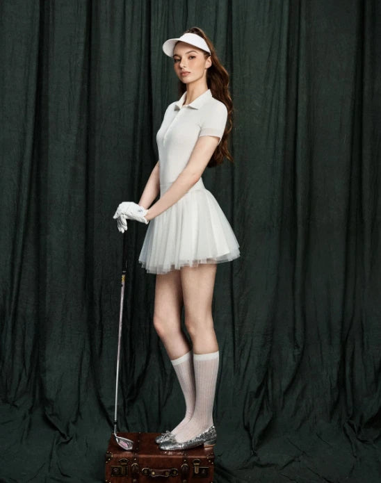 NowRose White golf polo and skirt three-quarter model view