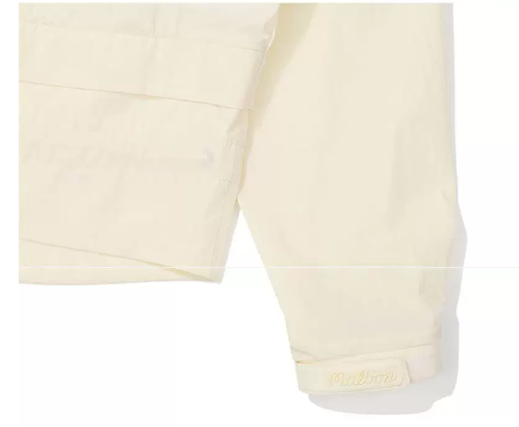 Malbon Women's Convertible Lightweight Golf Jacket Beige lightweight golf jacket detail view