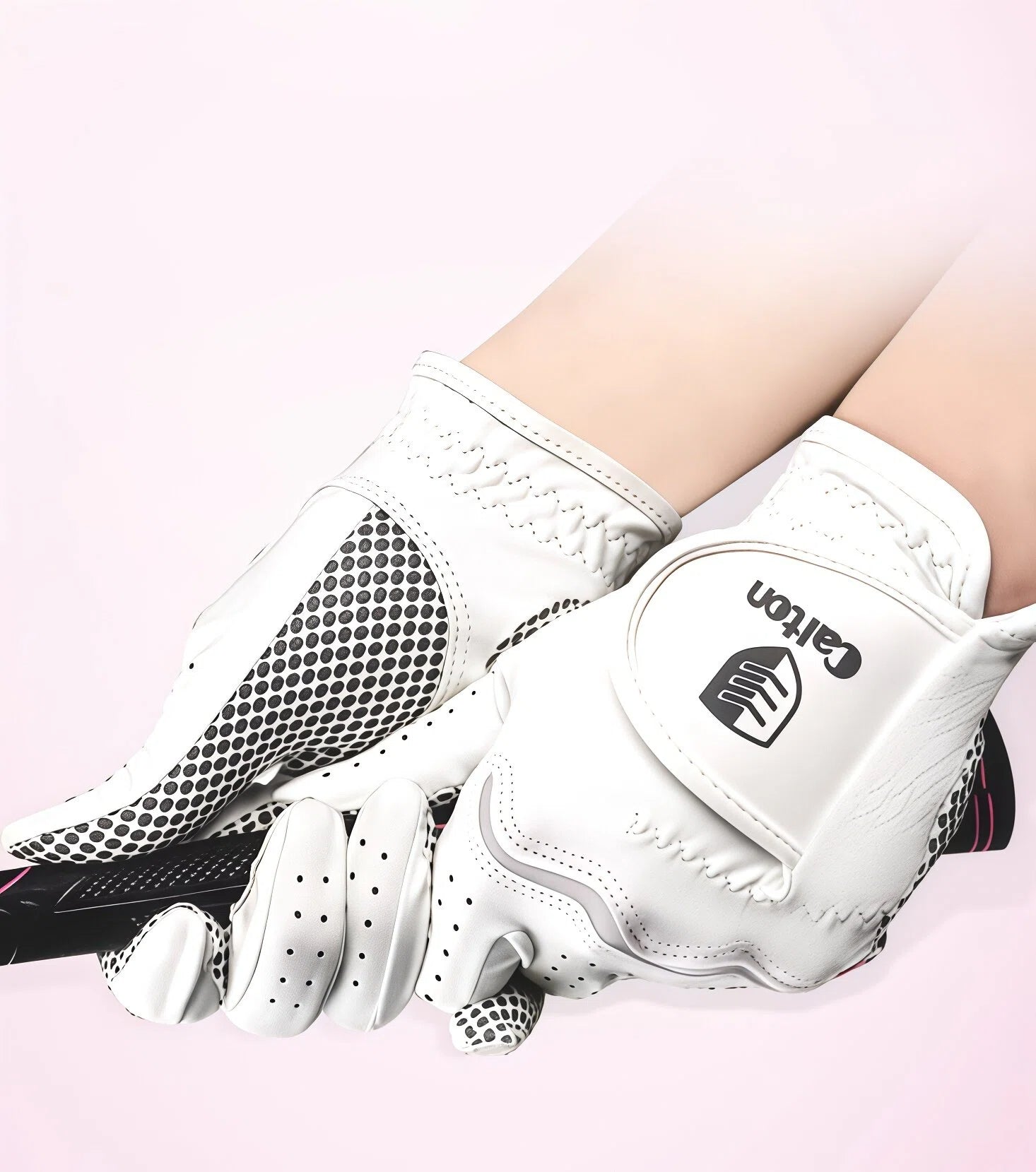 Cation women's golf gloves in action, gripping a golf club, highlighting the anti-slip palm, breathable design, and secure fit for optimal performance on the course.