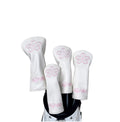 Set of HONMA golf club headcovers in white PU leather, featuring delicate pink sakura (cherry blossom) embroidery and "HONMA" branding, designed to protect your driver, fairway woods, and hybrids with a feminine and elegant touch.