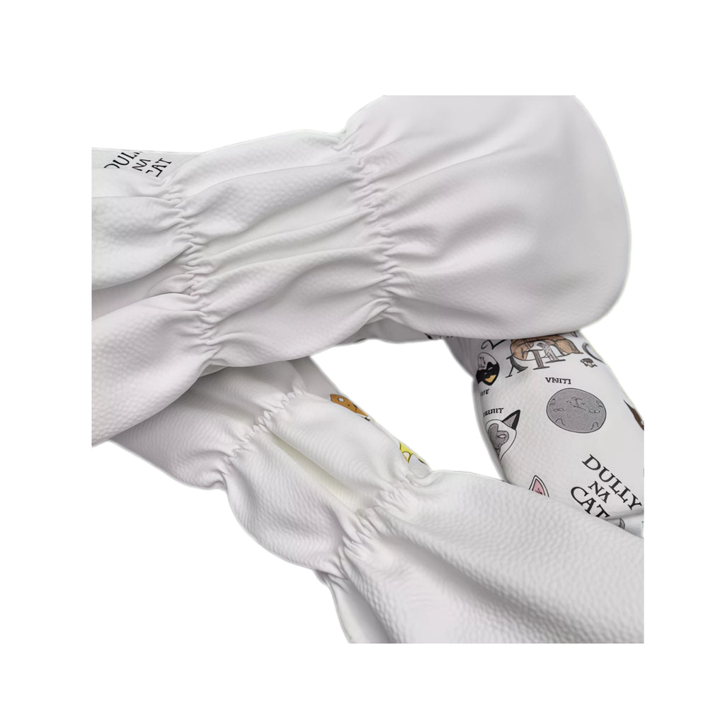 Close-up of Lazy Cat golf headcover showing elastic hem detail and colorful cat face print, highlighting durable PU material and secure fit.