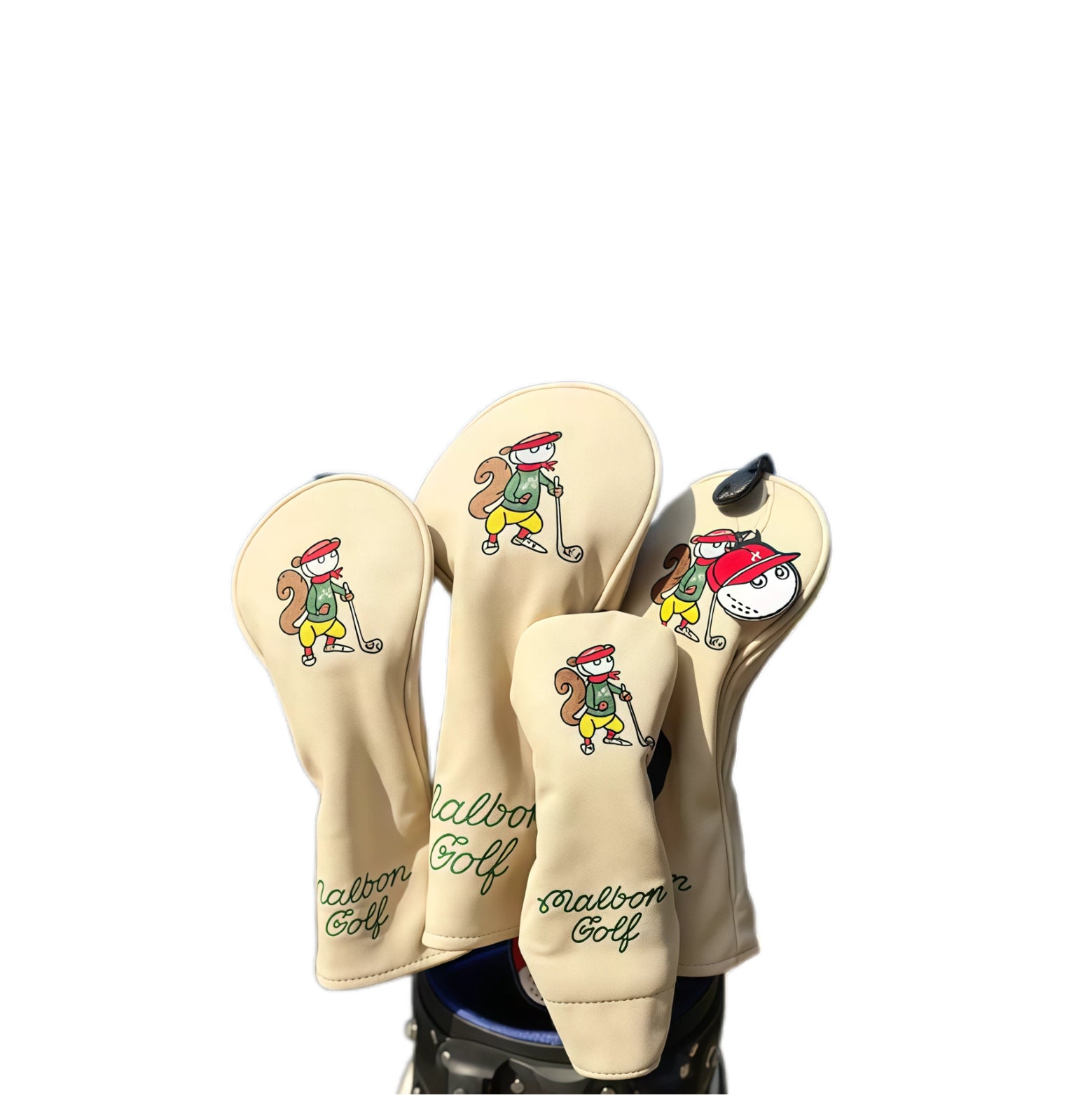 Malbon Caddie Embroidered Golf Headcovers Set in beige with cartoon squirrel caddie embroidery and green "Malbon Golf" script - magnetic closure design for driver, fairway, iron, and putter protection