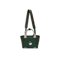 Front shot of the Malbon green and brown mini tote bag with a cute golf ball mascot wearing a hat. Premium texture, dual carrying options, and vintage golf aesthetic.