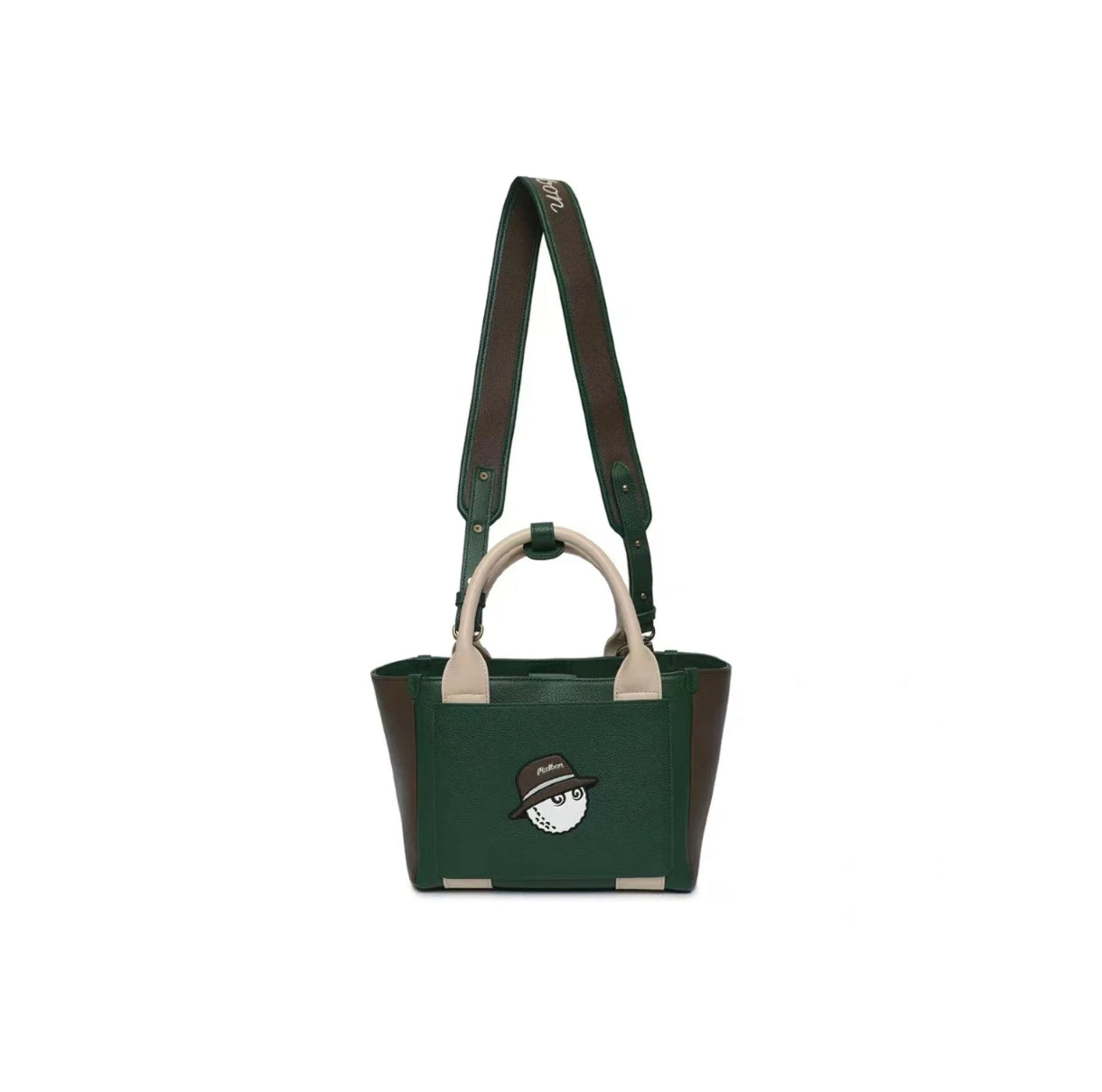 Front shot of the Malbon green and brown mini tote bag with a cute golf ball mascot wearing a hat. Premium texture, dual carrying options, and vintage golf aesthetic.