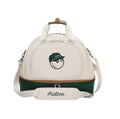 Front view of cream-colored Malbon golf duffle bag with green bottom panel, dual top handles, shoulder strap, and cute golf ball character wearing a green cap with "Malbon" logo