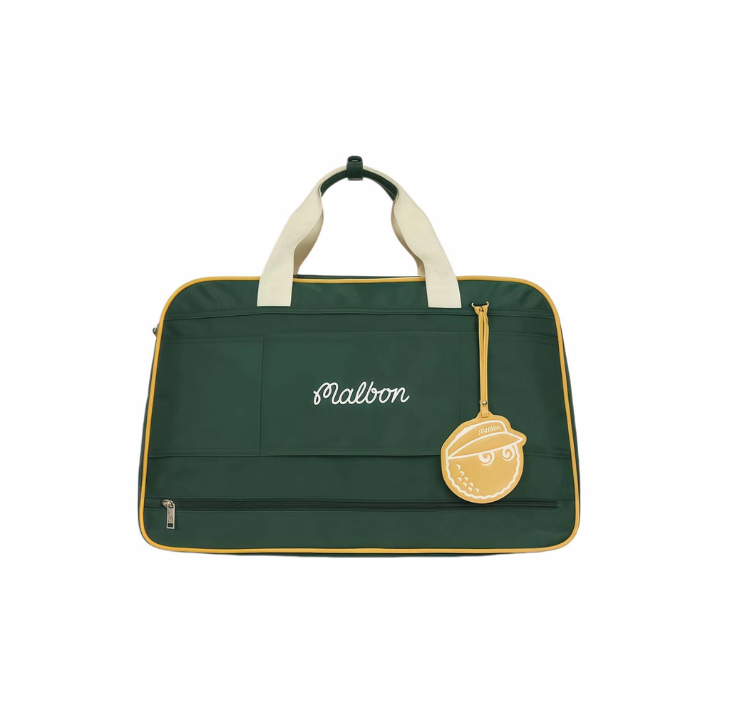 Front view of green Malbon golf duffle bag with clean design, white "Malbon" script embroidery, yellow trim, and hanging golf ball-shaped keychain