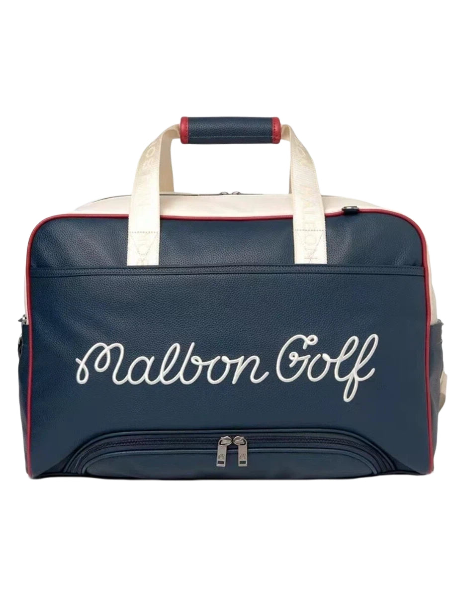 Front view of navy blue Malbon golf duffle bag with white cursive "Malbon Golf" embroidery, red piping, and dual zippers on shoe compartment
