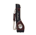 Full side view of Malbon Golf Classic Sunday bag in black and burgundy with elegant script logo and cartoon golf ball mascot wearing a hat. Stylish and functional for casual play.