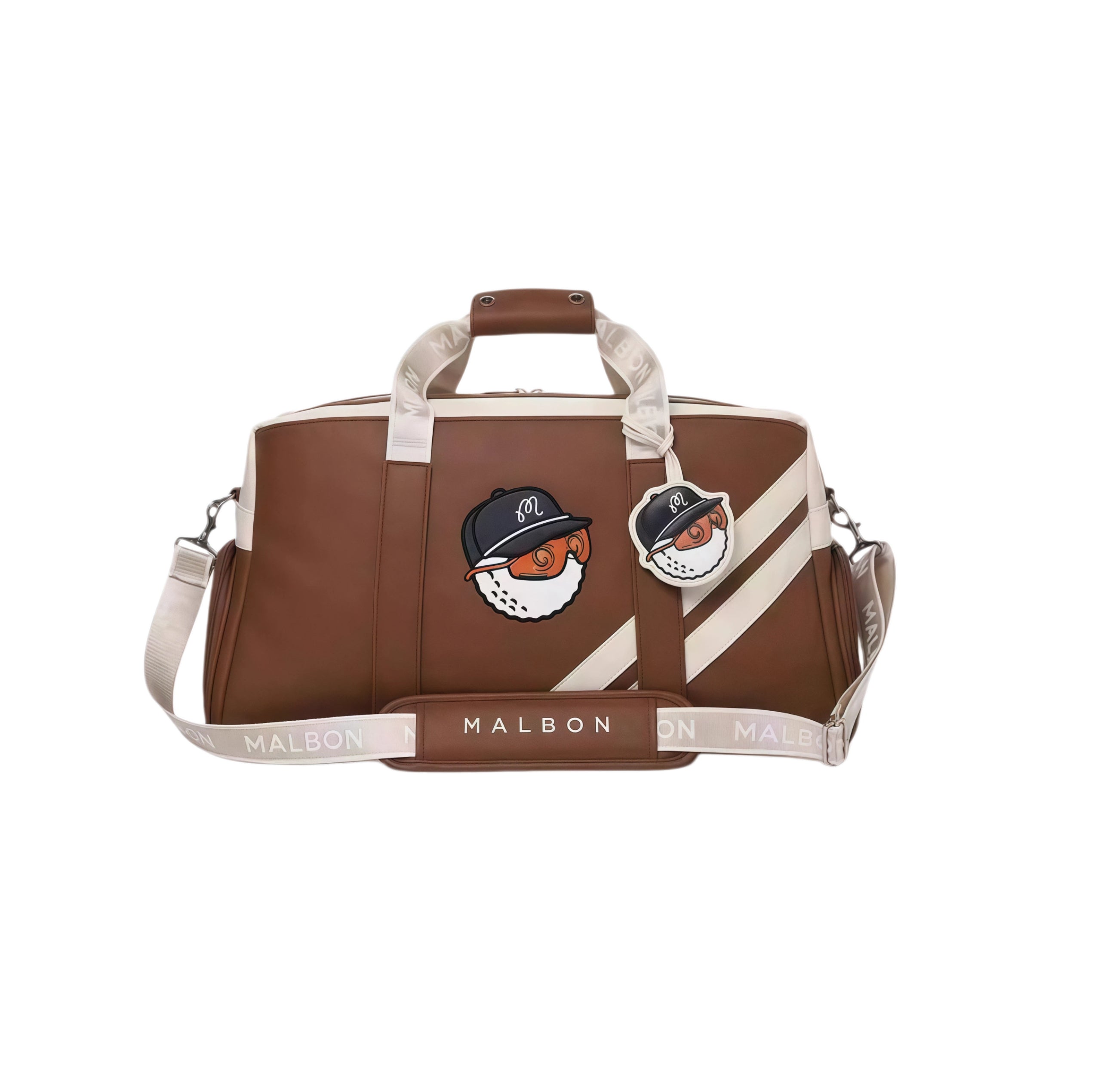 Brown Malbon Golf Core duffle bag with a fun golf ball mascot wearing a black cap and orange goggles. Includes a branded charm tag, white contrast stripes, and "MALBON" printed on the shoulder strap. Premium design for golf lovers.