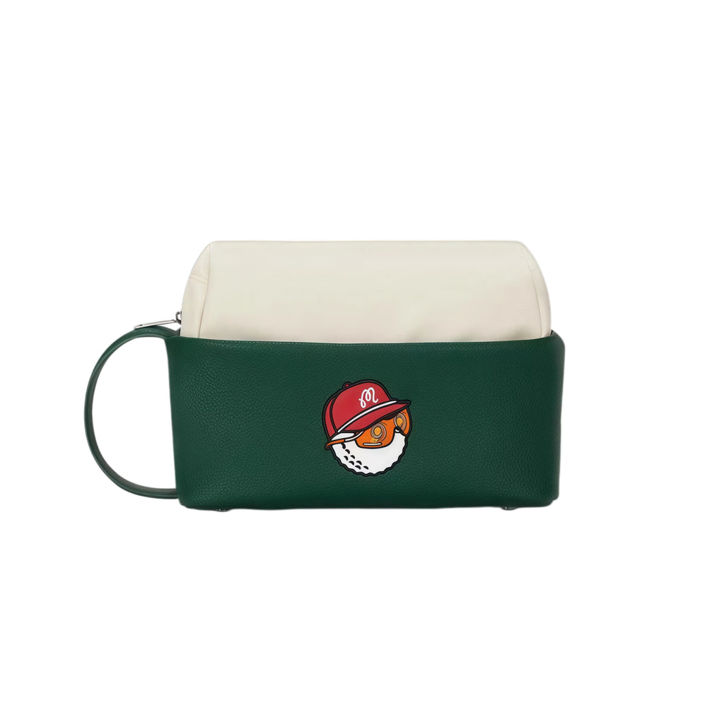 Side view of green Malbon golf pouch highlighting a playful cartoon golf ball character wearing a red cap with "M" logo, loop handle, and durable zipper closure.