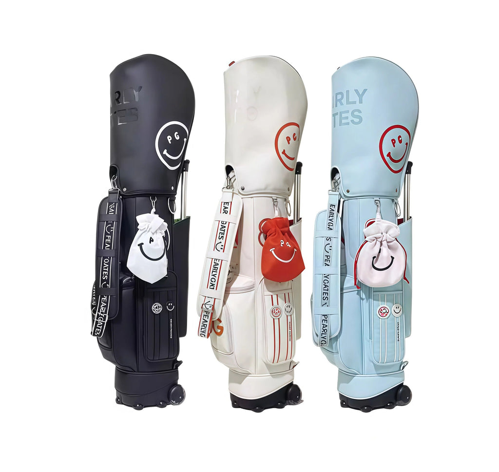 Three-color lineup of PG Smiley golf trolley bags in black, white, and light blue. Each features waterproof PU construction, smiley face logo, and matching drawstring pouch.