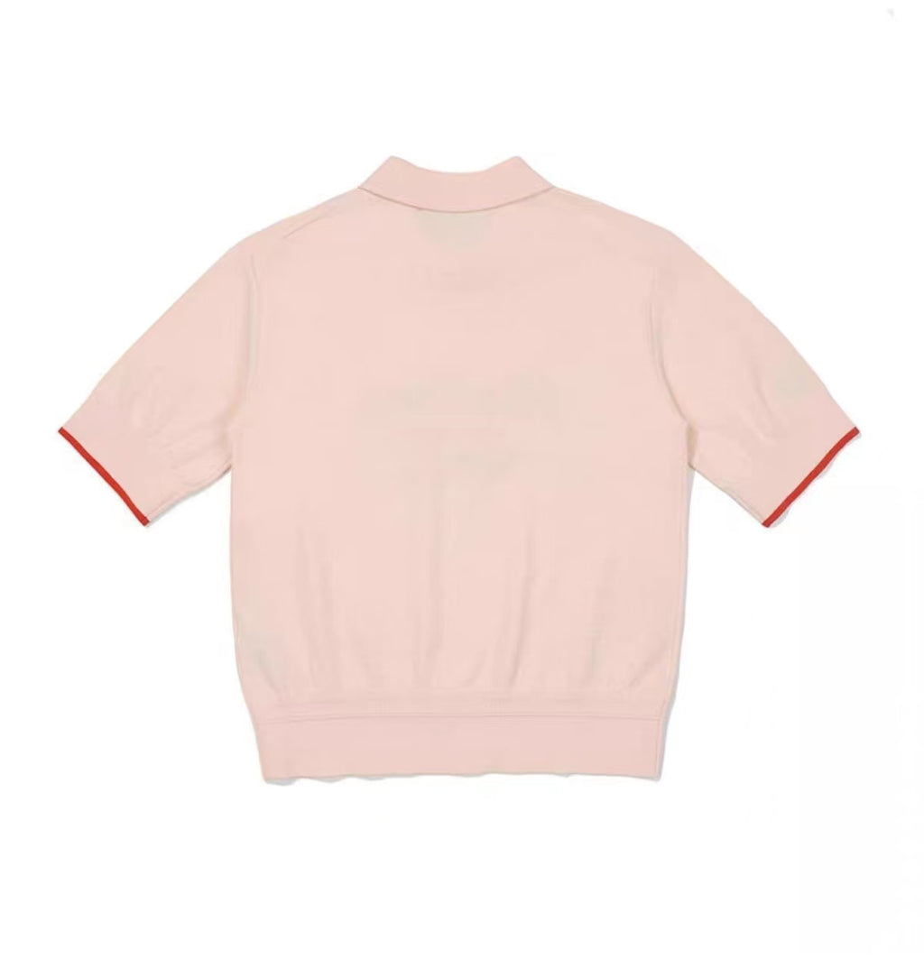 Malbon Women's Embroidered Breathable Golf Polo Pink breathable golf polo front view