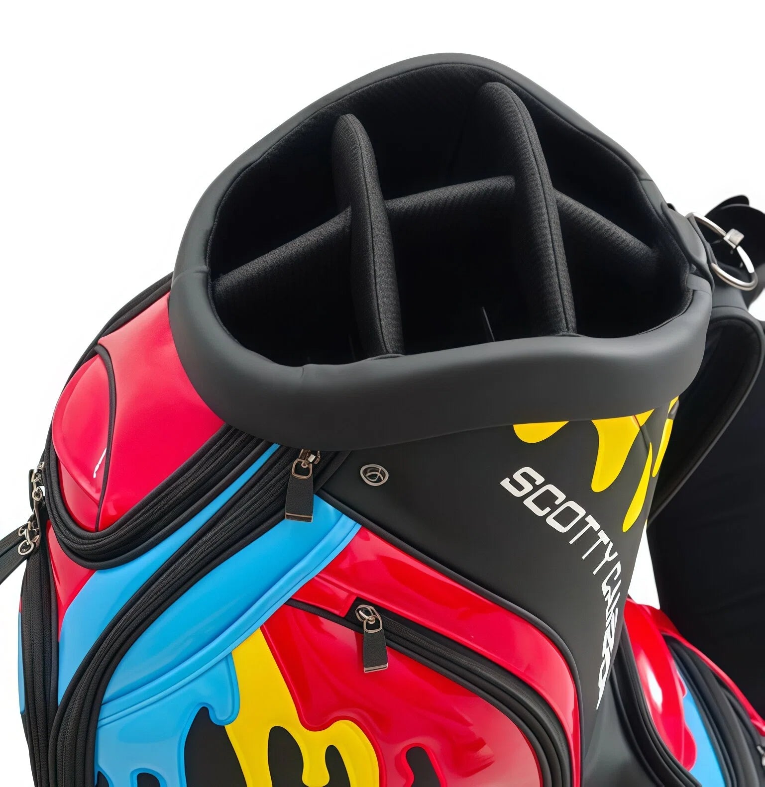 A top-down view into the Scotty Cameron 2025 Paint Drip Tour Bag, revealing the premium black 7-way divider system designed for organized club storage and protection.
