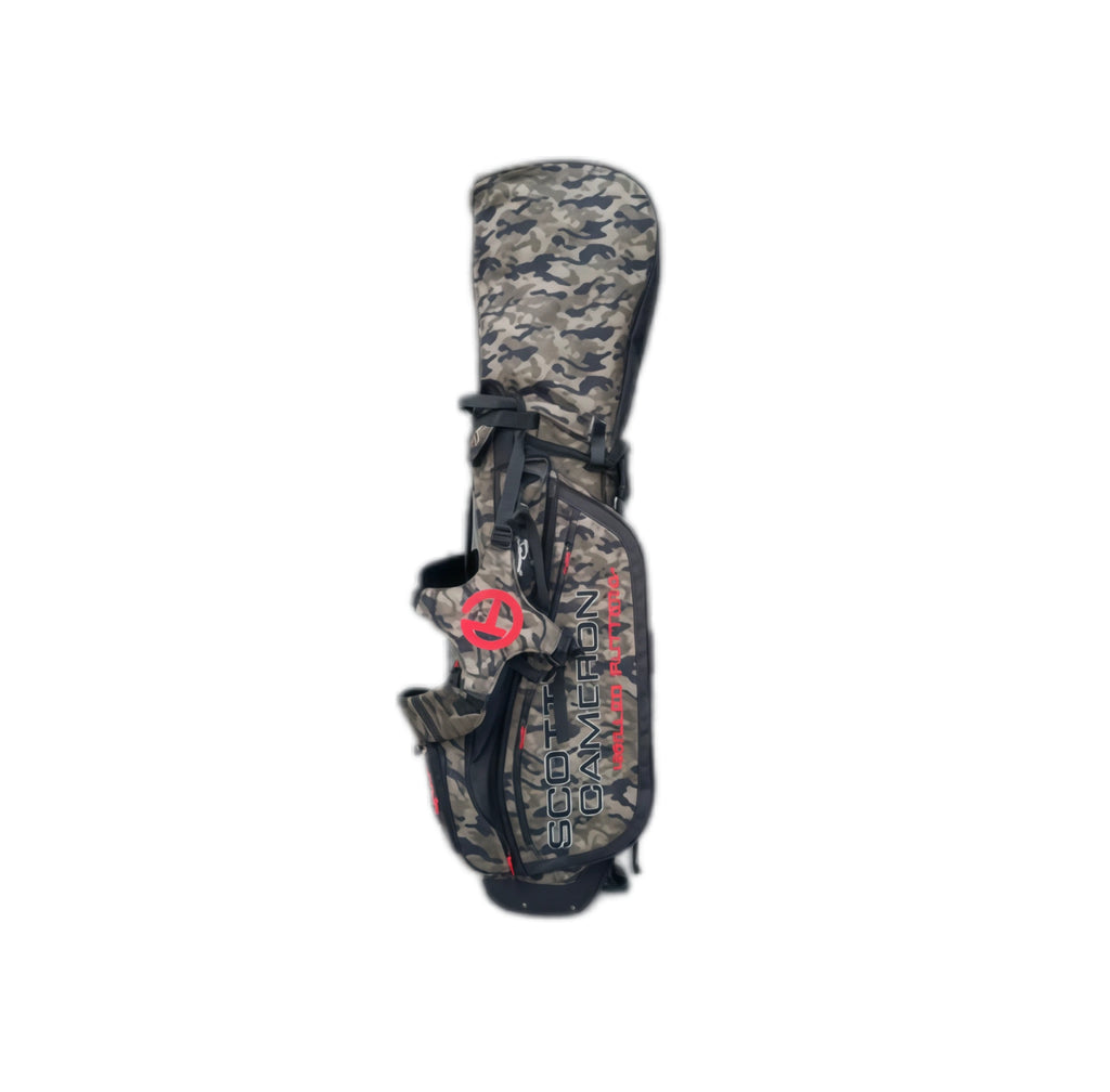 Full vertical view of the Scotty Cameron Junior Camo-Red Stand Bag, showing the complete camouflage pattern, red Circle T emblem, and integrated stand system against a clean white backdrop.