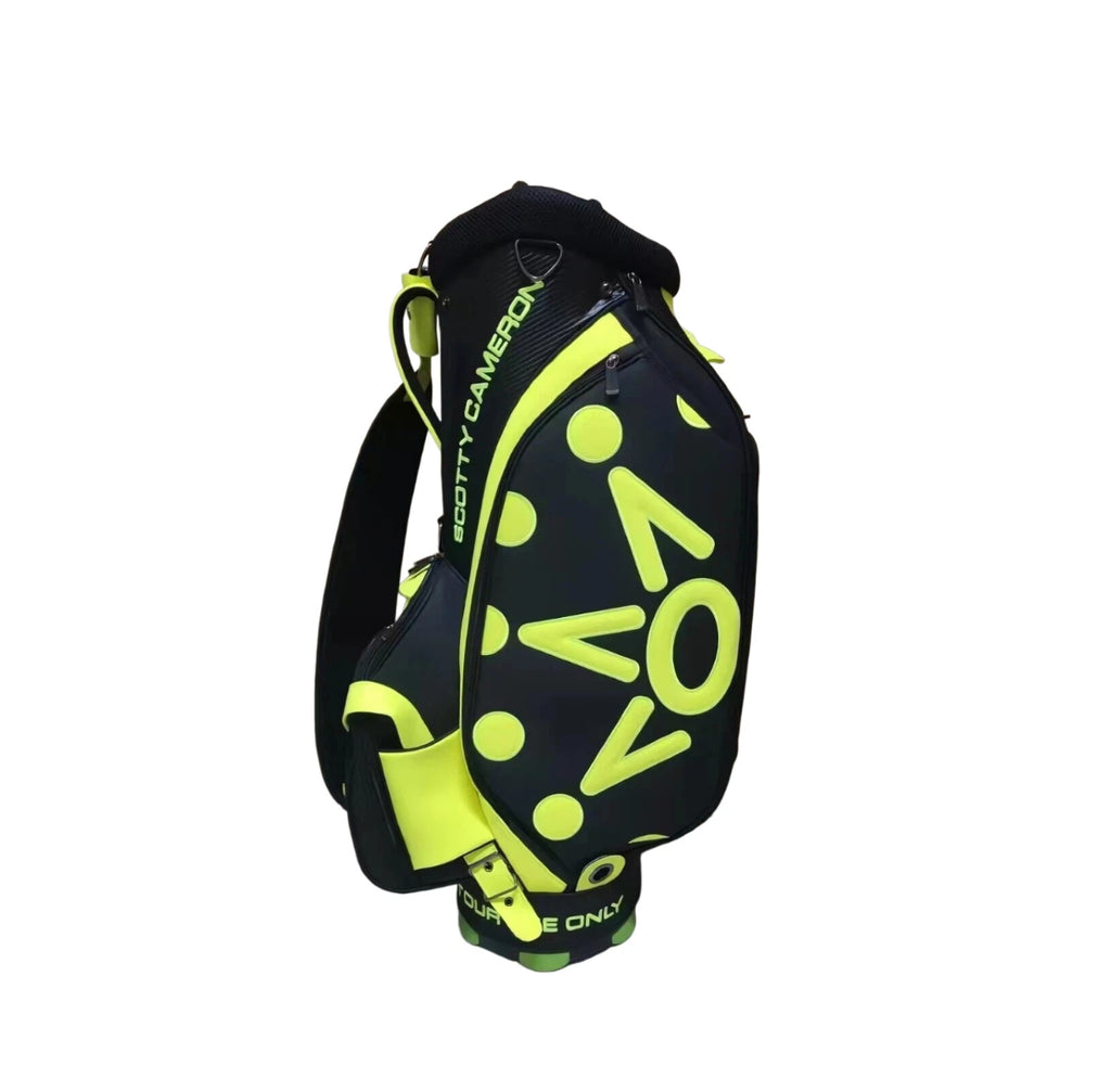 Alternate side view of the Scotty Cameron Staff Bag 2022 Tour Bag, displaying the bold neon yellow “TOUR USE ONLY” pattern and structured silhouette designed for professional golfers.