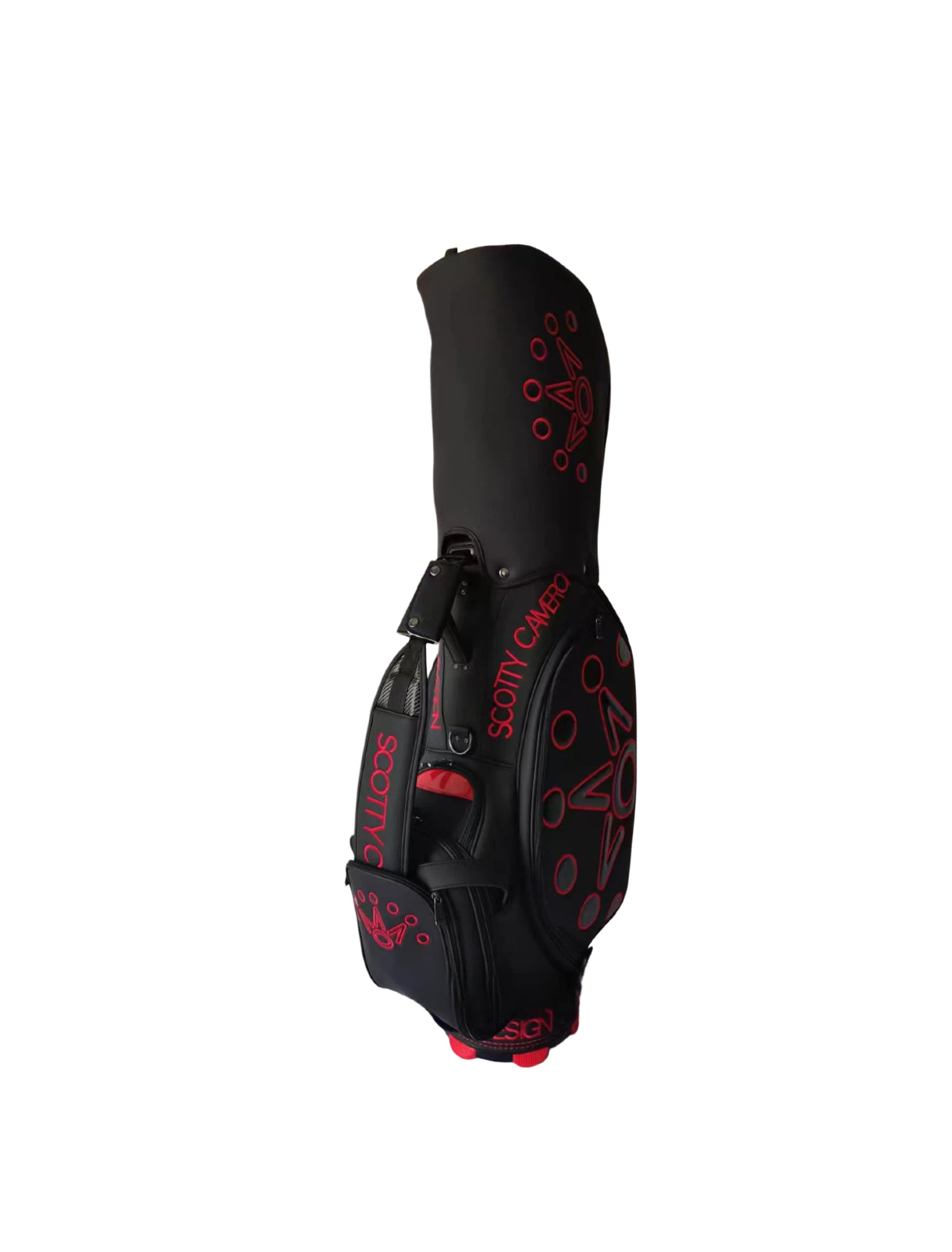 Side view of the Scotty Cameron Supercar Staff Bag in black, featuring the distinctive red "NOV" crown graphic, "SCOTTY CAMERON" branding, and premium leather construction with red accents on the base.