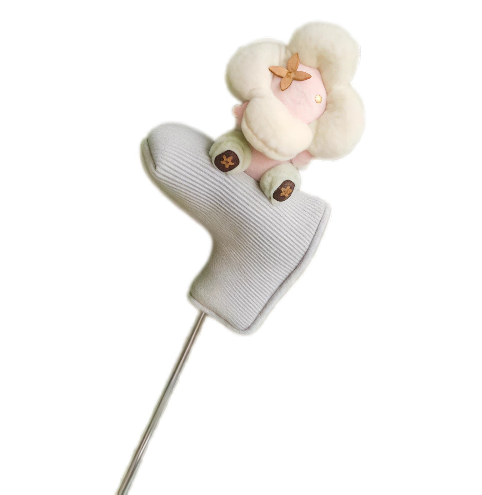Close-up of a small gray hybrid or iron headcover topped with a cream plush sunflower accessory, showcasing versatility for different club sizes and added charm.
