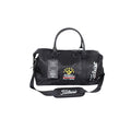 Front view of the black Titleist x Scotty Cameron Duffel Bag featuring the Scotty Cameron crown logo, "Titleist" script on side, and retail tag. Premium limited edition golf travel bag.
