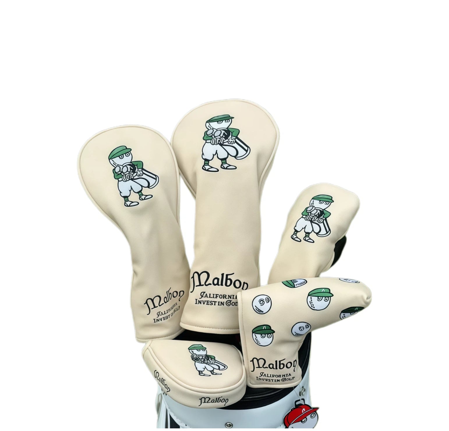 Complete cream Universal Leather Golf Headcover set featuring the iconic Malbon caddy logo, including driver, fairway, hybrid, and mallet putter covers, displayed on a golf bag.