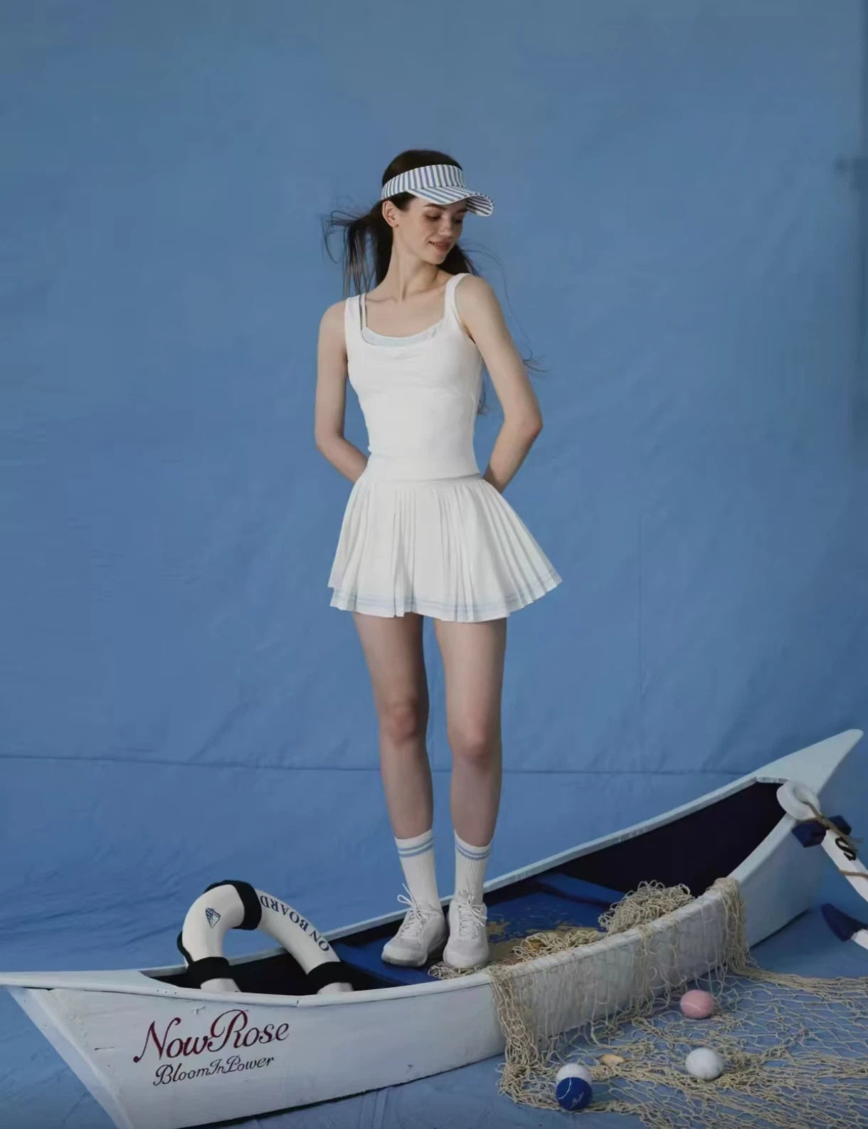 NowRose White tennis golf skort rear view on model