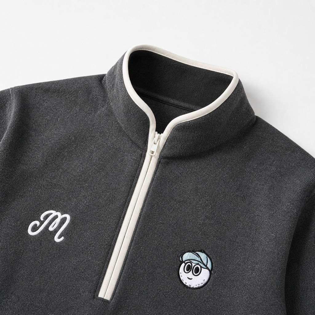 Malbon grey golf pullover collar and cream zip detail